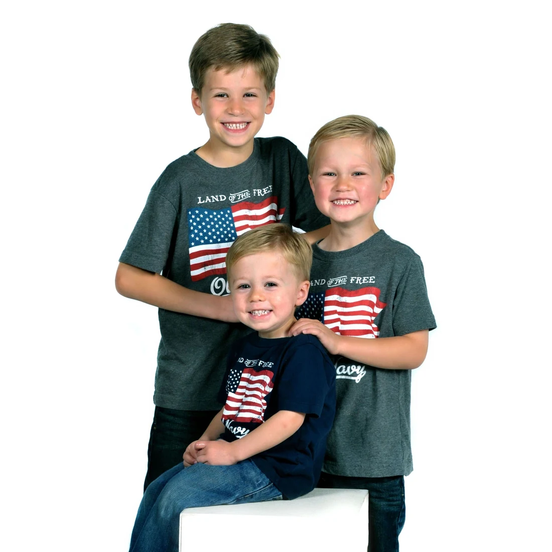 Three smiling young brothers